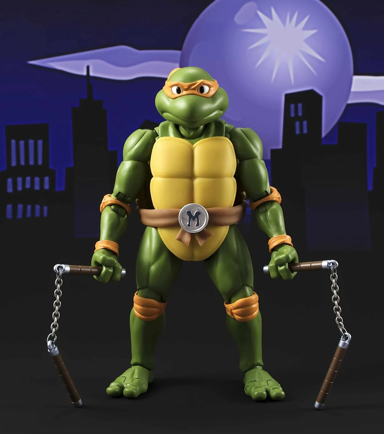 Teenage Mutant Ninja Turtles Michelangelo action figure in battle pose