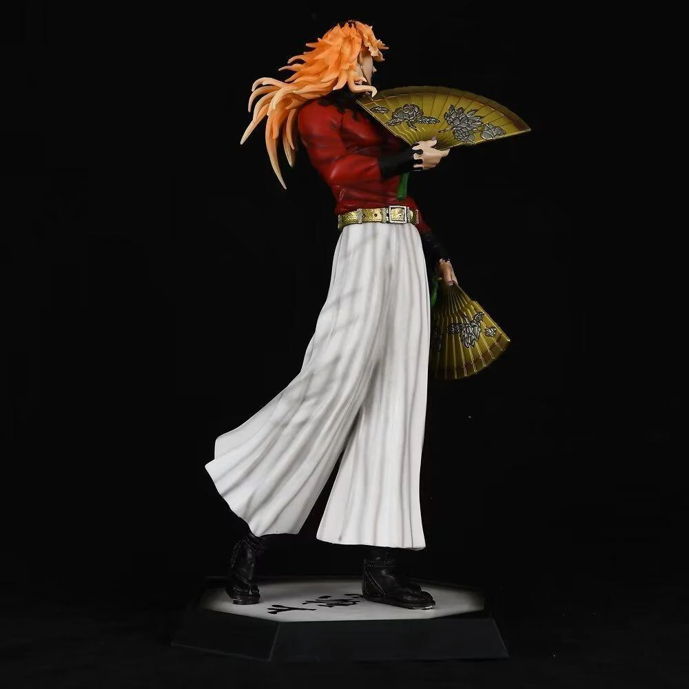 Douma figure displayed with other Demon Slayer items