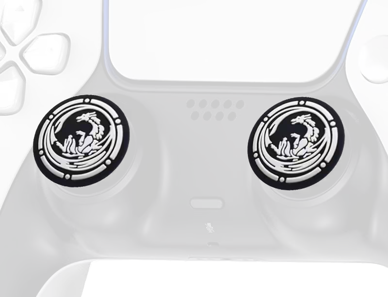 Black FireDrake thumb grips with white dragon emblems