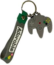 ميدالية سلسلة مفاتيح على شكل كنترولر N64 نينتندو سويتش - رمادي